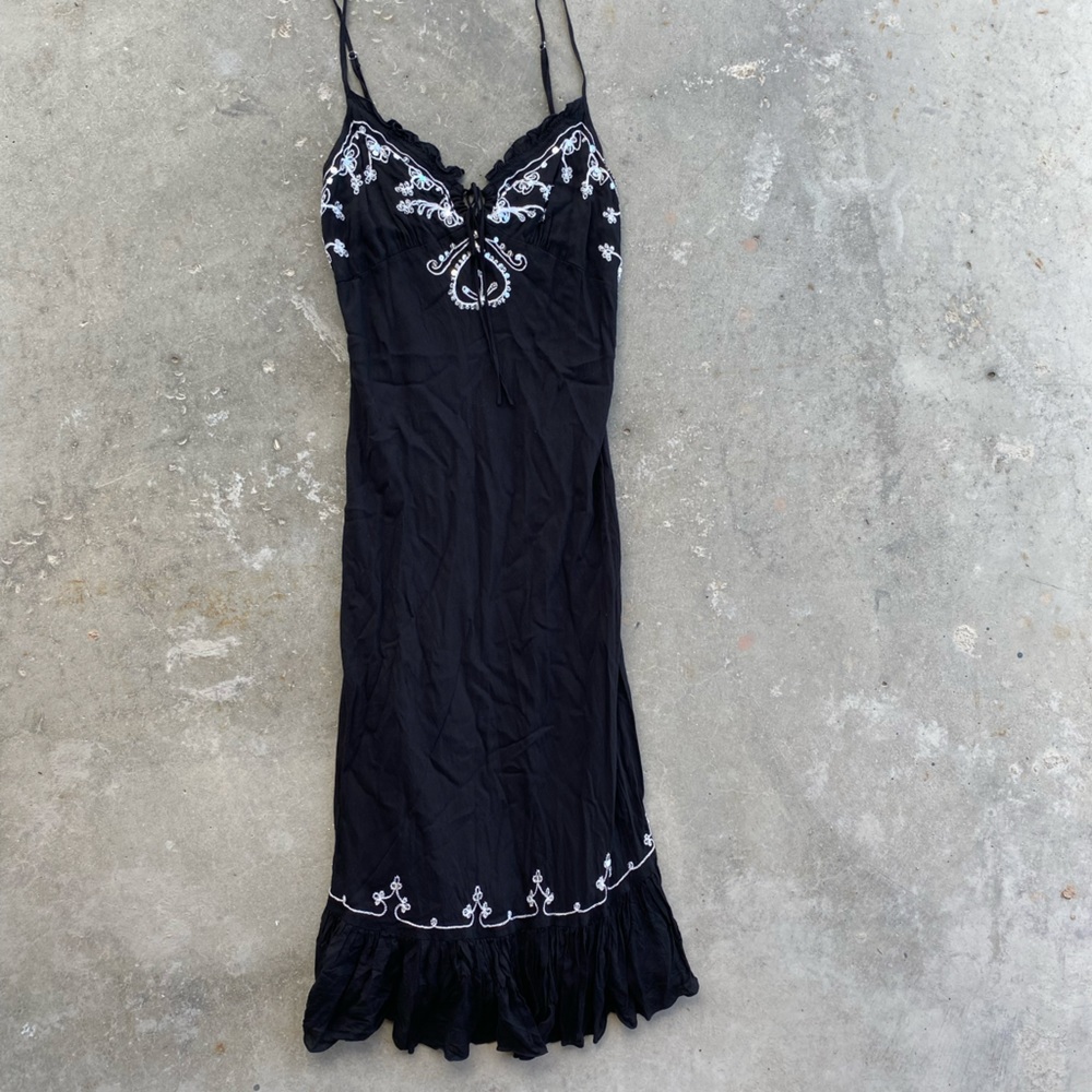 Women’s dress size XL but fits more like a M